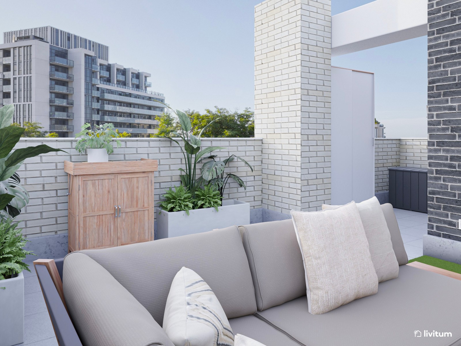 Terraza moderna con chill out en color gris y césped ornamental