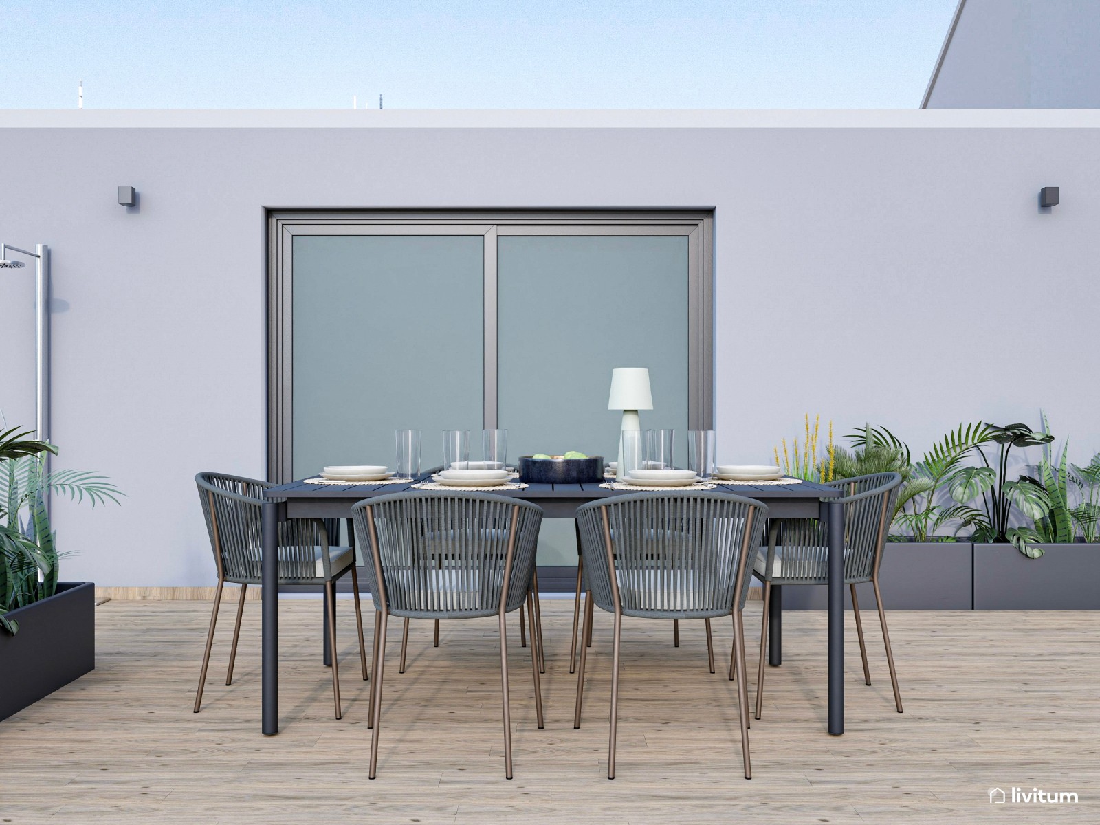 Terraza moderna con fantásticas vistas y muebles en tonos neutros