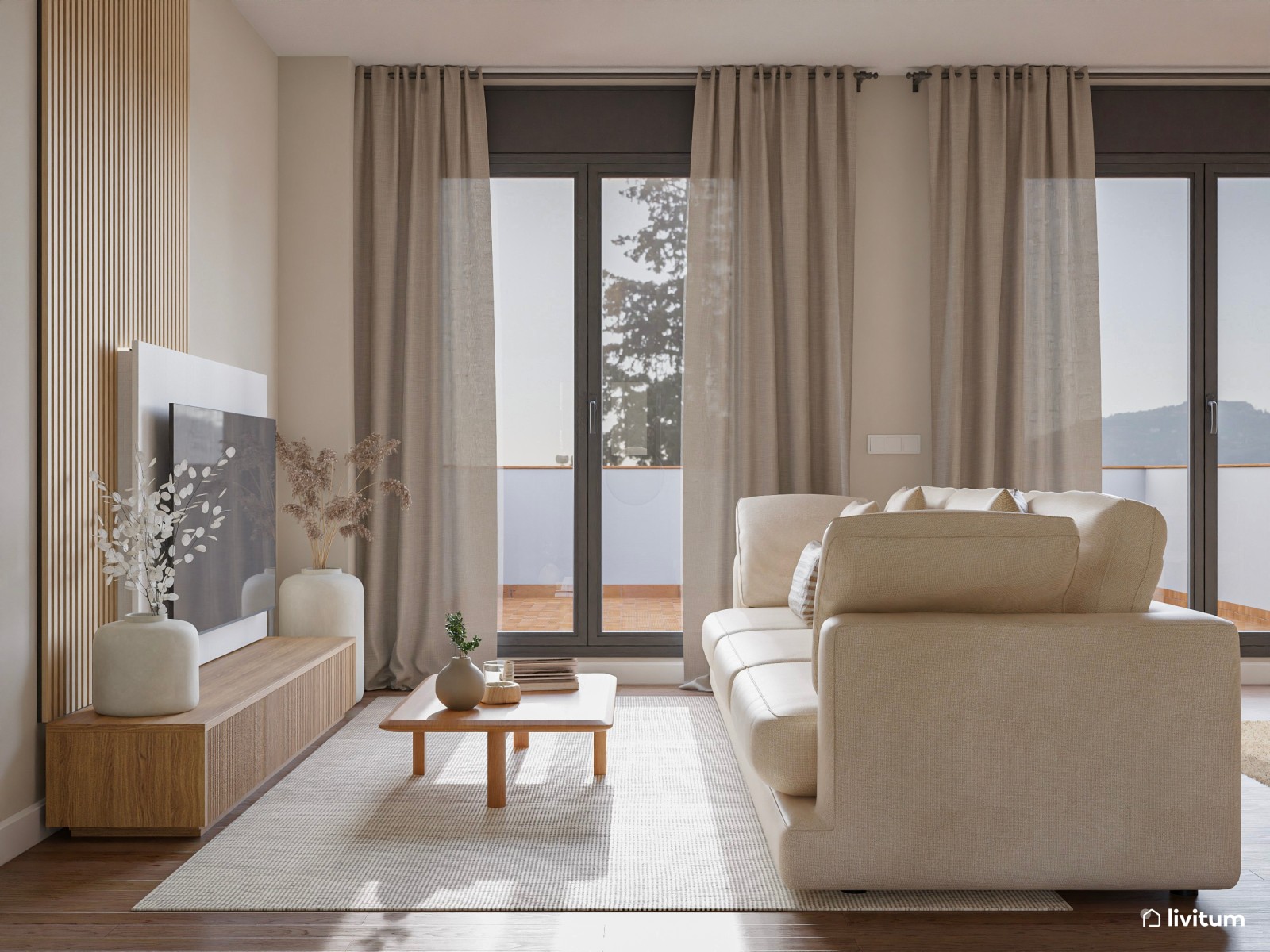 Una sala muy luminosa con muebles bajos y detalles vanguardistas